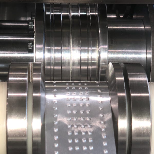 Dimple strip at for roll inlet of folded tube mill